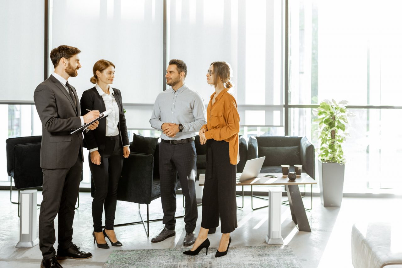 San Diego business founders and partners consulting with Joe Phillips on succession planning and organizational health for their high-growth company.